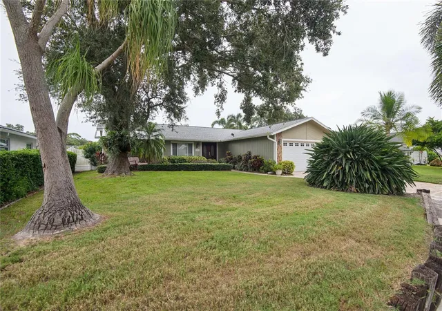 Photo 1 of Single family home for sale at 13511 Rustic Pines Blvd S, Seminole, FL 33776 | MLS# O6448733 | Listing updated on 2026-10-10