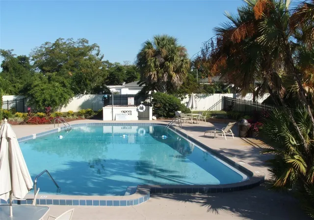 Listing Photo 1 - Condo for sale in building located at 5317 Curry Frd Rd, Orlando, FL 32812 - Unit #J102