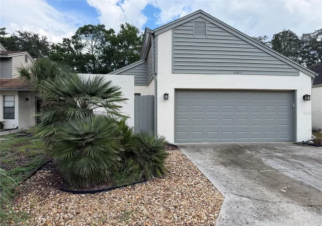 Photo 1 of Condo for sale at 13811 Lazy Oak Dr #21, Tampa, FL 33613 | MLS# W7890222 | Listing updated on 2026-10-10