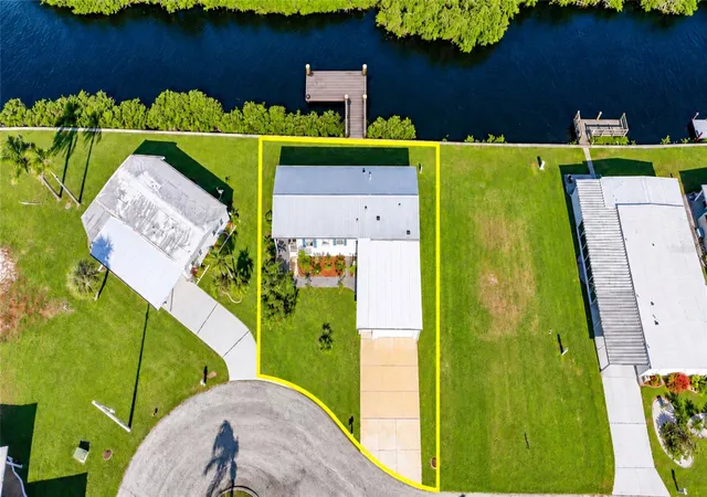 Photo 1 of Manufactured home for sale at 734 Blackburn Blvd, North Port, FL 34287 | MLS# C7531815 | Listing updated on 2026-10-22