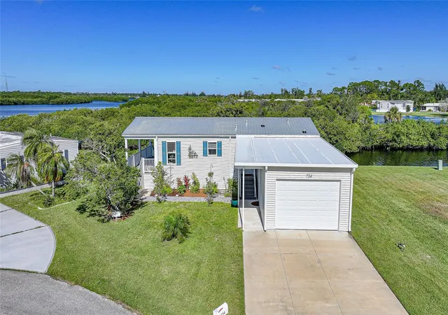 Photo 2 of Manufactured home for sale at 734 Blackburn Blvd, North Port, FL 34287 | MLS# C7531815 | Listing updated on 2026-10-22