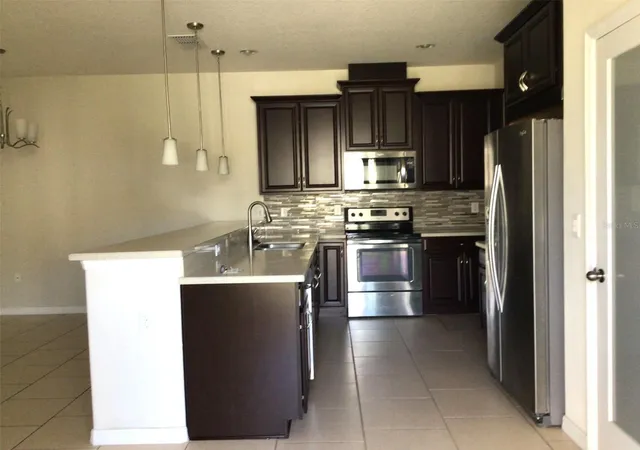 Photo 2 of Townhouse for sale at 2564 Fassona Dr, Kissimmee, FL 34741 | MLS# O6448764 | Listing updated on 2026-10-12
