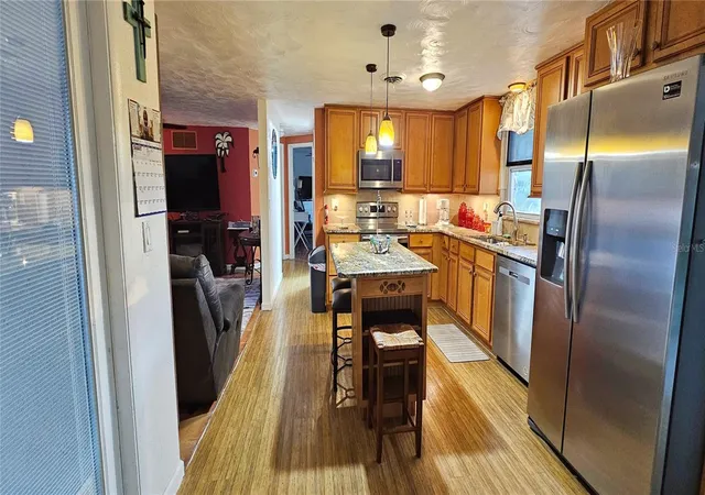 Photo 4 of Single family home for sale at 1120 Lampp Dr, Englewood, FL 34223 | MLS# A4709089 | Listing updated on 2026-10-10