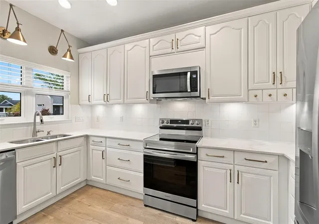 Photo 2 of Townhouse for sale at 5303 Point Pleasant Ln, Tampa, FL 33611 | MLS# TB8556707 | Listing updated on 2026-10-20
