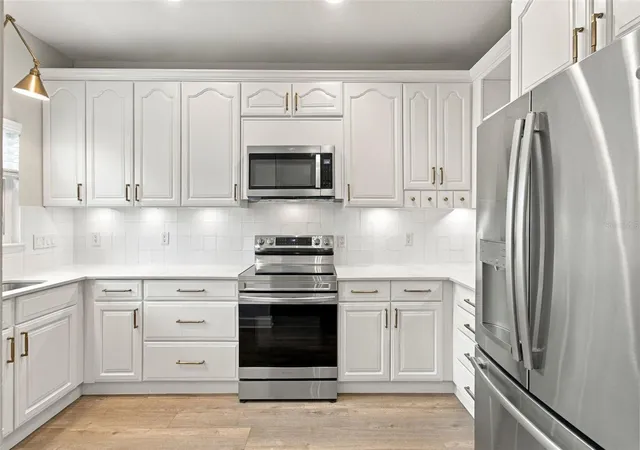 Photo 3 of Townhouse for sale at 5303 Point Pleasant Ln, Tampa, FL 33611 | MLS# TB8556707 | Listing updated on 2026-10-20