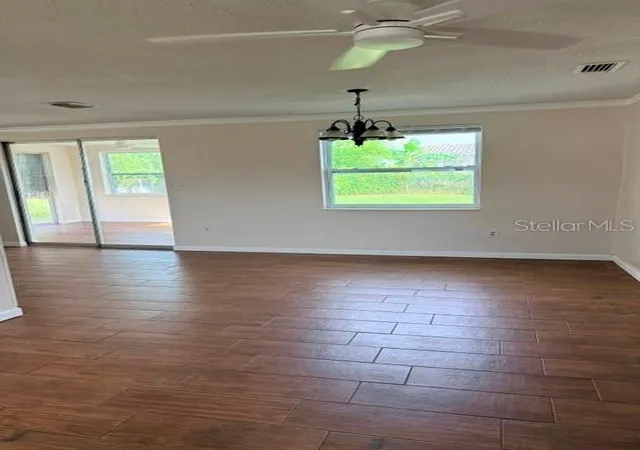 Photo 4 of Single family home for sale at 7323 Oak Crst Dr, Port Richey, FL 34668 | MLS# W7890226 | Listing updated on 2026-10-10