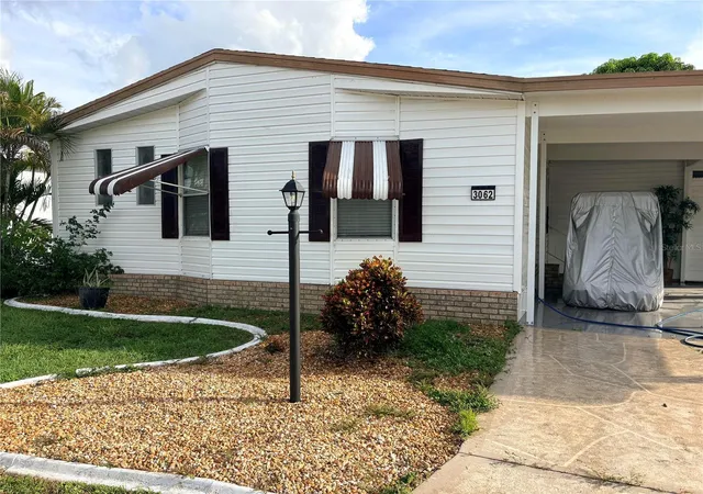 Photo 1 of Manufactured home for sale at 3062 Artesian Ln, North Fort Myers, FL 33917 | MLS# A4709105 | Listing updated on 2026-10-10