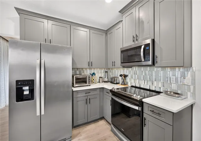 Photo 3 of Condo for sale at 7521 Laureate Blvd #5103, Orlando, FL 32827 | MLS# O6448822 | Listing updated on 2026-10-10