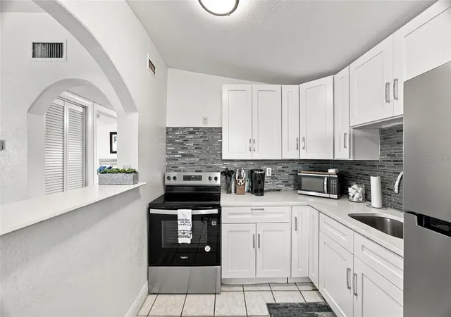 Photo 4 of Single family home for sale at 1906 E 98th Avenue, Tampa, FL 33612 | MLS# TB8556764 | Listing updated on 2026-10-28