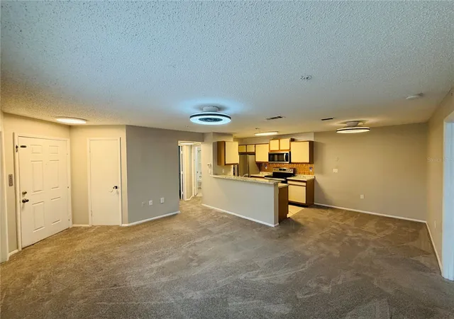 Photo 4 of Condo for sale at 633 Buoy Ln #205, Altamonte Springs, FL 32714 | MLS# O6448866 | Listing updated on 2026-10-10