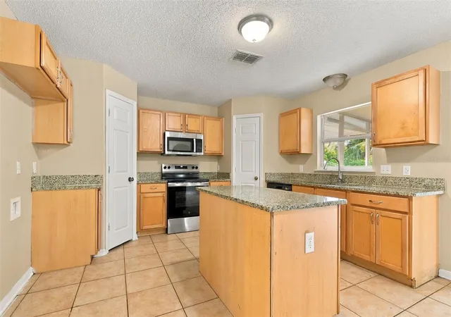 Photo 3 of Single family home for sale at 2228 Sandridge Cir, Eustis, FL 32726 | MLS# O6448877 | Listing updated on 2026-10-10