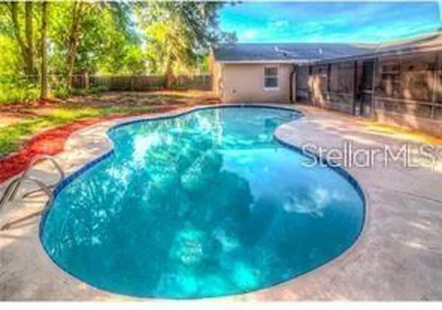 Photo 2 of Single family home for sale at 100 Huntswood Ct, Longwood, FL 32750 | MLS# O6448879 | Listing updated on 2026-10-10