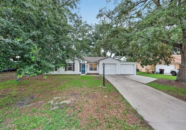 Photo 4 of Single family home for sale at 303 Oak Trak Pass, Ocala, FL 34472 | MLS# OM733801 | Listing updated on 2026-10-10