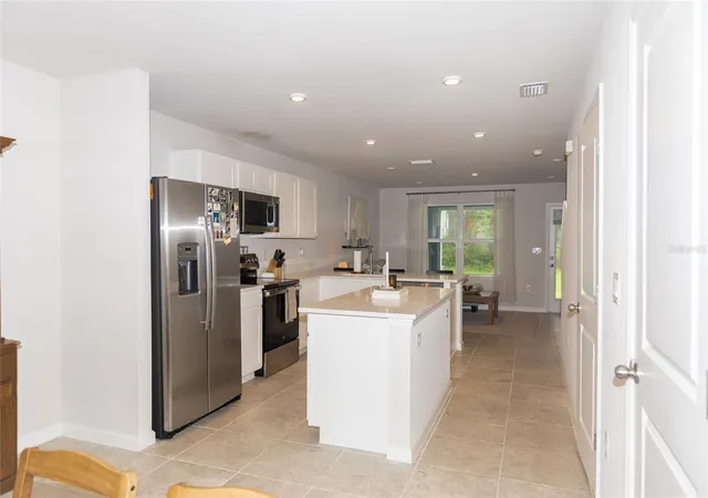 Photo 4 of Townhouse for sale at 11398 Spectacled Dr, New Port Richey, FL 34654 | MLS# TB8556855 | Listing updated on 2026-10-11