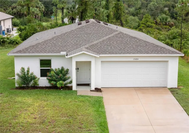 Photo 1 of Single family home for sale at 13084 Parham Ave, Port Charlotte, FL 33953 | MLS# C7531840 | Listing updated on 2026-10-10