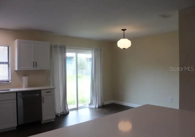Photo 2 of Single family home for sale at 12082 SE 61st Court, Belleview, FL 34420 | MLS# OM733807 | Listing updated on 2026-10-21
