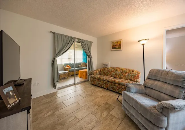 Photo 2 of Condo for sale at 4712 Marine Pkwy #105, New Port Richey, FL 34652 | MLS# TB8556882 | Listing updated on 2026-10-11