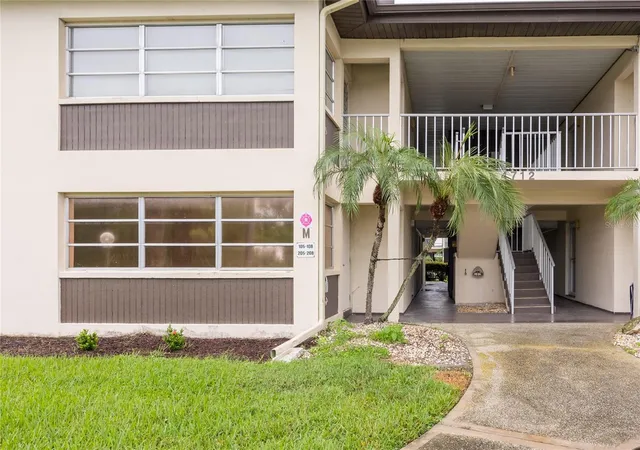 Listing Photo 4 - Condo for sale in building located at 4712 Marine Pkwy, NEW PORT RICHEY, FL 34652 - Unit #105
