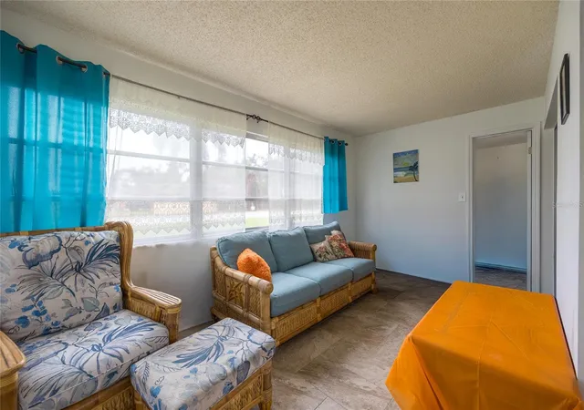 Listing Photo 5 - Condo for sale in building located at 4712 Marine Pkwy, NEW PORT RICHEY, FL 34652 - Unit #105