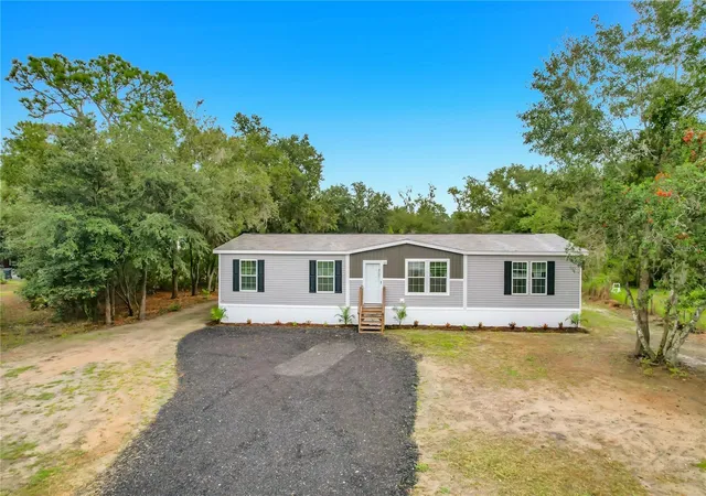 Photo 2 of Manufactured home for sale at 9717 Moore Rd, Lakeland, FL 33809 | MLS# L4965694 | Listing updated on 2026-10-11