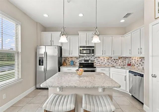 Photo 1 of Townhouse for sale at 10818 Sunset Ridge Ln, Orlando, FL 32832 | MLS# O6448958 | Listing updated on 2026-10-22