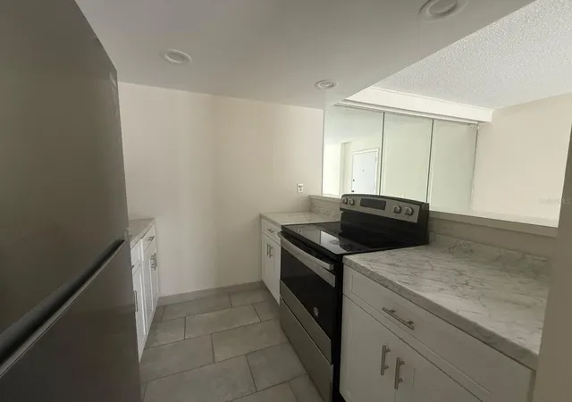 Photo 3 of Condo for sale at 941 W Oak Ridge Rd #D, Orlando, FL 32809 | MLS# S5159296 | Listing updated on 2026-10-14