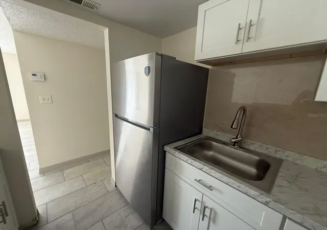 Photo 4 of Condo for sale at 941 W Oak Ridge Rd #D, Orlando, FL 32809 | MLS# S5159296 | Listing updated on 2026-10-14