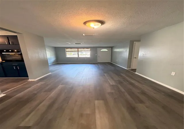 Photo 3 of Single family home for sale at 5604 Cheyenne Dr, Holiday, FL 34690 | MLS# W7890236 | Listing updated on 2026-10-16