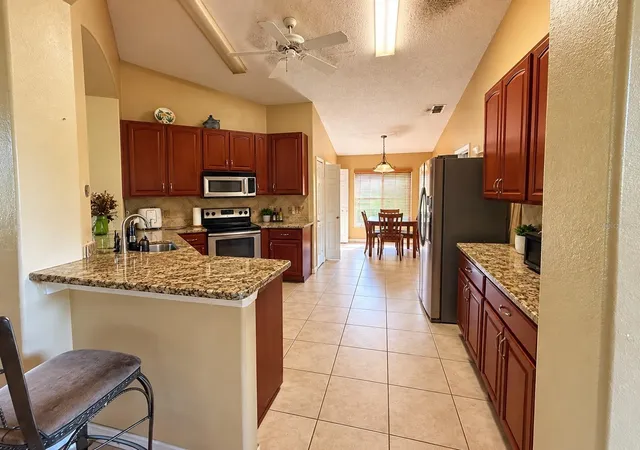 Photo 2 of Single family home for sale at 4135 Coralbrooke Grv, Orlando, FL 32826 | MLS# O6448967 | Listing updated on 2026-10-16