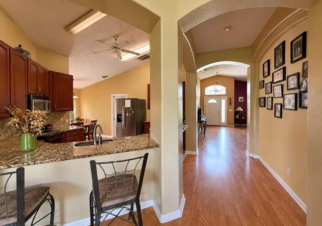 Photo 3 of Single family home for sale at 4135 Coralbrooke Grv, Orlando, FL 32826 | MLS# O6448967 | Listing updated on 2026-10-16