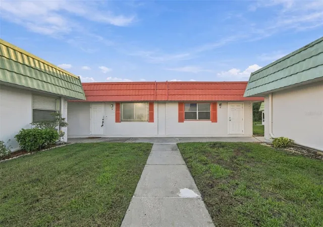 Photo 1 of Condo for sale at 1802 Bedford Ln #9, Sun City Center, FL 33573 | MLS# TB8556928 | Listing updated on 2026-10-11
