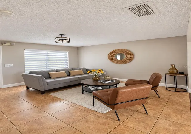 Photo 2 of Single family home for sale at 14316 Sun Bay Dr, Orlando, FL 32824 | MLS# S5159310 | Listing updated on 2026-10-11