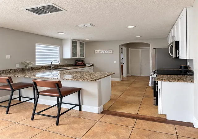 Photo 4 of Single family home for sale at 14316 Sun Bay Dr, Orlando, FL 32824 | MLS# S5159310 | Listing updated on 2026-10-11