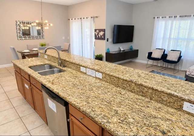 Photo 2 of Townhouse for sale at 8961 Bismarck Palm Rd, Kissimmee, FL 34747 | MLS# O6449007 | Listing updated on 2026-10-11
