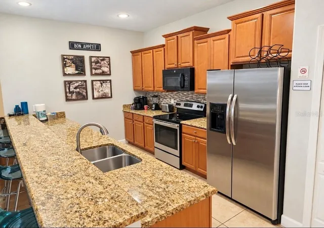 Photo 3 of Townhouse for sale at 8961 Bismarck Palm Rd, Kissimmee, FL 34747 | MLS# O6449007 | Listing updated on 2026-10-11