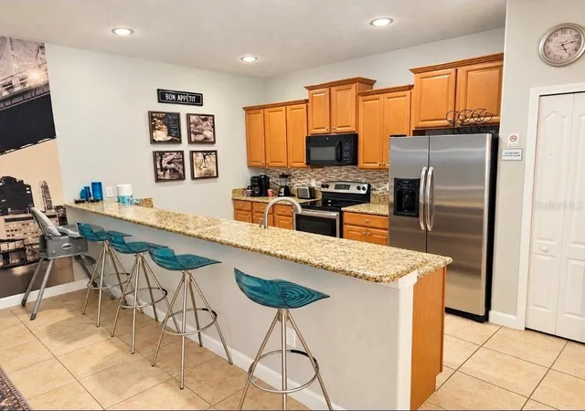 Photo 3 of Townhouse for sale at 8961 Bismarck Palm Rd, Kissimmee, FL 34747 | MLS# O6449007 | Listing updated on 2026-10-11