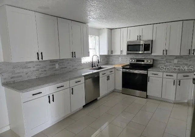 Photo 2 of Single family home for sale at 6104 Polk St, New Port Richey, FL 34653 | MLS# TB8556968 | Listing updated on 2026-10-18