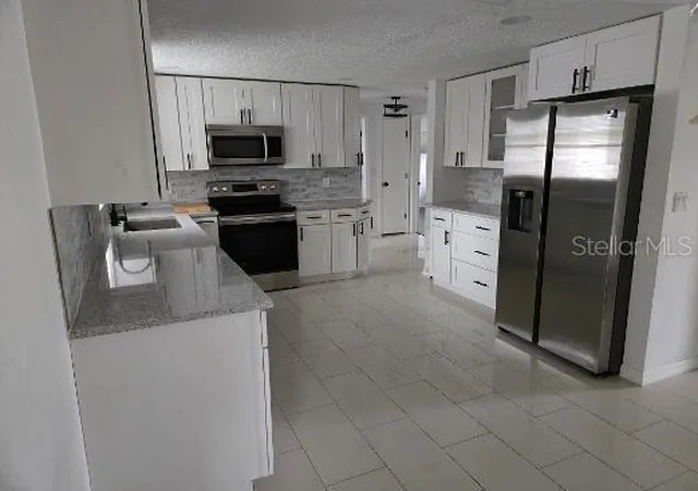 Photo 3 of Single family home for sale at 6104 Polk St, New Port Richey, FL 34653 | MLS# TB8556968 | Listing updated on 2026-10-18