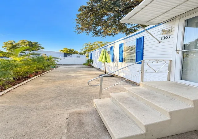 Photo 2 of Manufactured home for sale at 1301 Live Oak Pkwy, Tarpon Springs, FL 34689 | MLS# W7890243 | Listing updated on 2026-10-20