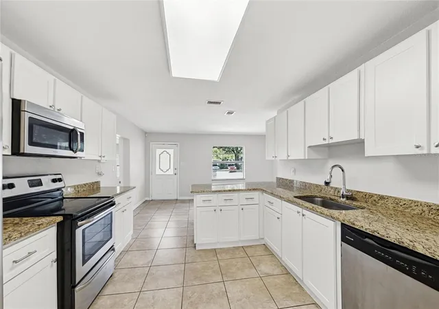 Photo 4 of Single family home for sale at 2903 E 97th Avenue, Tampa, FL 33612 | MLS# TB8556976 | Listing updated on 2026-10-11