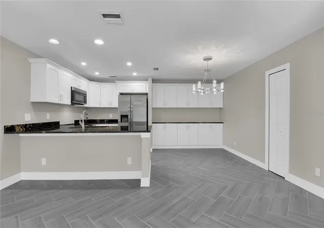 Photo 3 of House for sale at 4836-4838 Marine Dr, Cape Coral, FL 33904 | MLS# A4709194 | Listing updated on 2026-10-12
