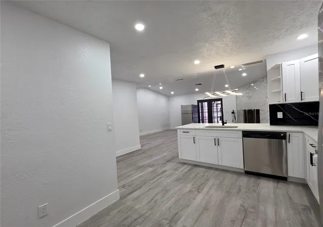 Photo 4 of Single family home for sale at 5044 Roanoke Dr, Holiday, FL 34690 | MLS# TB8557008 | Listing updated on 2026-10-11