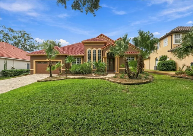 Photo 1 of Single family home for sale at 7628 Milano Dr, Orlando, FL 32835 | MLS# O6449056 | Listing updated on 2026-10-29
