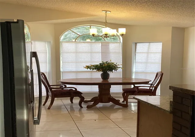 Photo 4 of Single family home for sale at 7160 Edgewater Shrs Ct, Orlando, FL 32810 | MLS# O6449059 | Listing updated on 2026-10-12