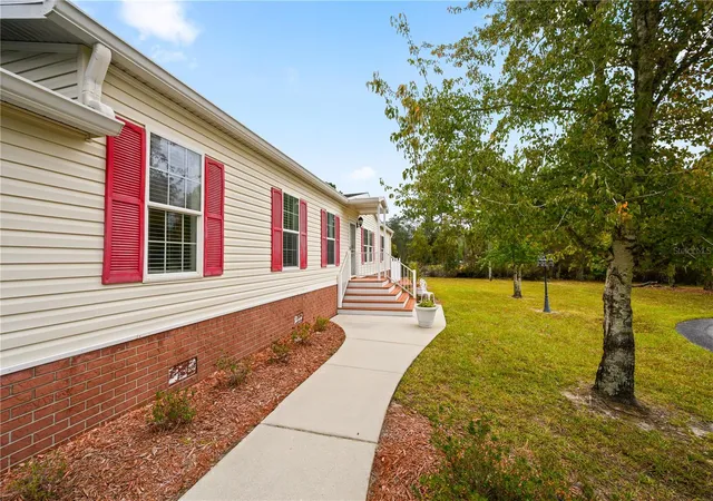Photo 1 of Manufactured home for sale at 10591 NE 112th Lane, Archer, FL 32618 | MLS# GC544101 | Listing updated on 2026-10-30
