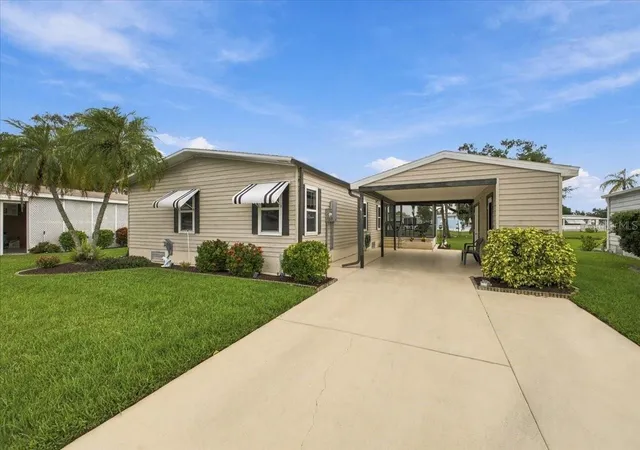 Photo 1 of Manufactured home for sale at 4 Meadowlark Cir, Ellenton, FL 34222 | MLS# A4709200 | Listing updated on 2026-10-12