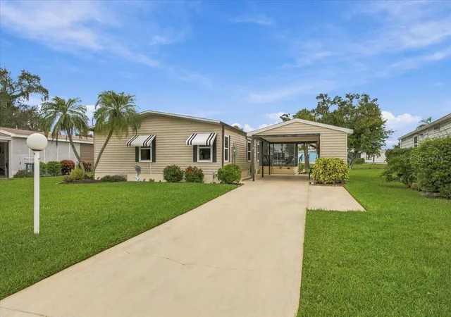 Photo 2 of Manufactured home for sale at 4 Meadowlark Cir, Ellenton, FL 34222 | MLS# A4709200 | Listing updated on 2026-10-12