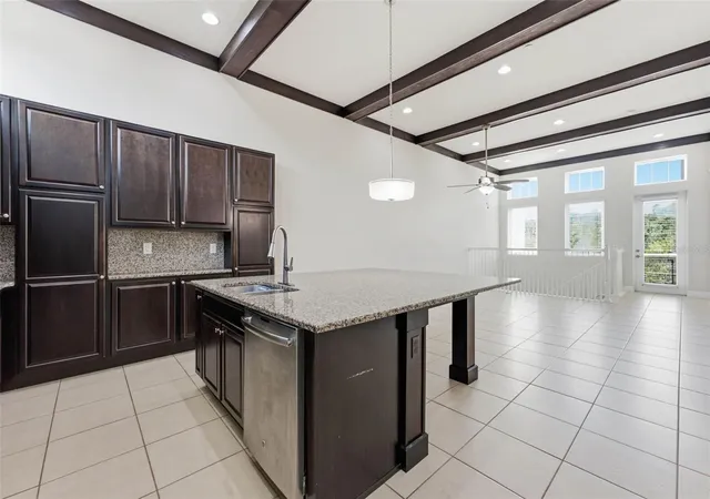 Photo 3 of Townhouse for sale at 9025 Laureate Blvd, Orlando, FL 32827 | MLS# O6449068 | Listing updated on 2026-10-21