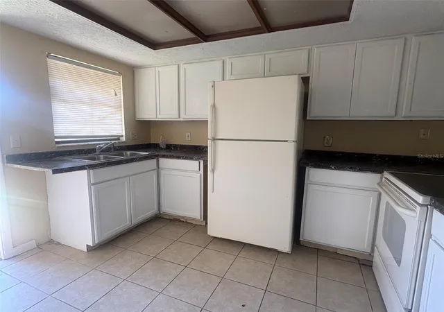 Photo 2 of Townhouse for sale at 12723 Lockey Ln, Tampa, FL 33612 | MLS# TB8557033 | Listing updated on 2026-10-15
