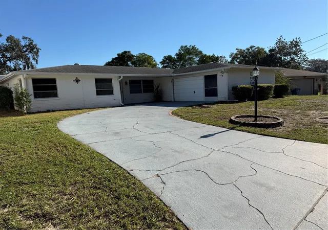 Photo 3 of Single family home for sale at 7400 Hiawatha Pkwy, Spring Hill, FL 34606 | MLS# TB8557036 | Listing updated on 2026-10-20